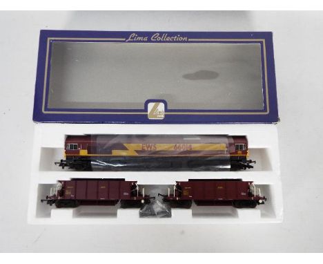 Lima - A boxed OO gauge Lima L149967 set containing a Class 66 diesel locomotive Op.No.66014 in EWS livery with two YGA 'Seac