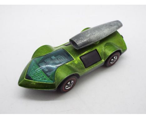 Hot Wheels - Redline - A 1971 Hong Kong made Rocket-Bye Baby in Light Green. The car appears in Near Mint condition with only