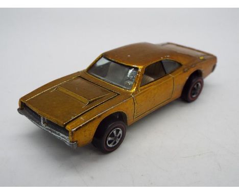 Hot Wheels - Redline - A Custom Charger in Gold. This model appears in Very Good condition with light signs of play use. (Thi