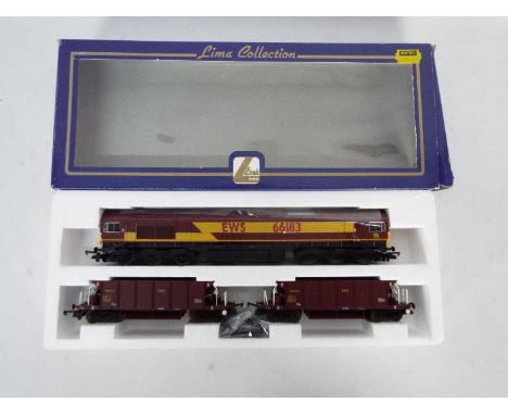 Lima - A boxed OO gauge Lima L149967 set containing a Class 66 diesel locomotive Op.No.66183 in EWS livery with two YGA 'Seac