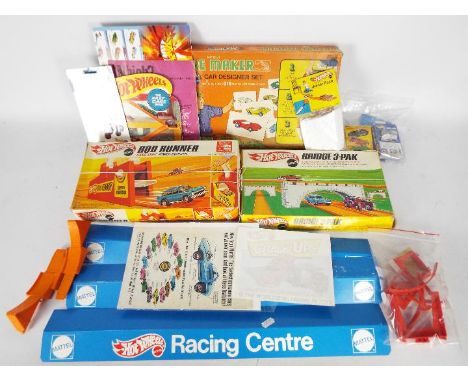 Hot Wheels - A collection of sets and miscellaneous collectible items including a boxed Rod Runner Power Booster, a boxed Bri