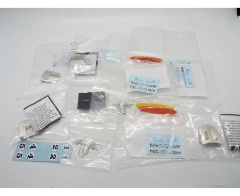 Hot Wheels - Redline - A collection of unused reproduction parts including surfboards, bonnets, decals, axles and decals. All