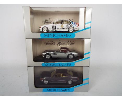 Minichamps - Three boxed 1:43 scale model vehicles from Minichamps. Lot consists of Minichamps #3414 Mercedes Benz 300 SE Con
