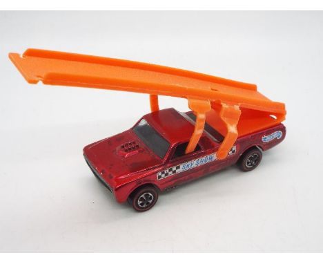 Hot Wheels - Redline - Sky Show - A Custom Fleetside Sky Show truck in Creamy Pink (?). This U.S. made model appears in Very 