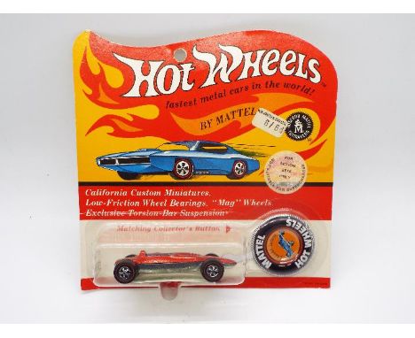 Hot Wheels - Redline - An unopened original carded Shelby Turbine in Rose. The car appears Mint on a Very Good card backing w