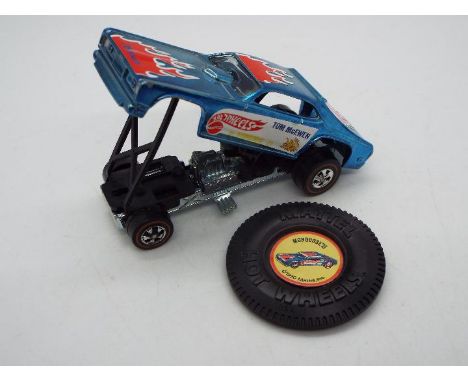 Hot Wheels - Redline - A Tom McEwan 'Mongoose II' Plymouth Duster drag car in Light Blue. This model is in Near Mint conditio