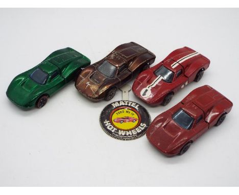 Hot Wheels - Redline - 4 x Ford Mk.IV racing cars in Green Brown and Enamel Red. The Green car and the Enamel Red car without