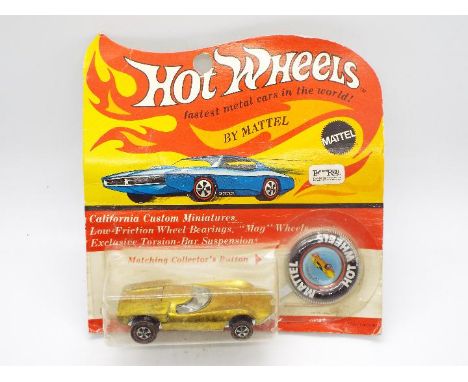 Hot Wheels - Redline - An unopened original Turbofire in Gold. This U.S. made model appears Mint on a Good card with some cre