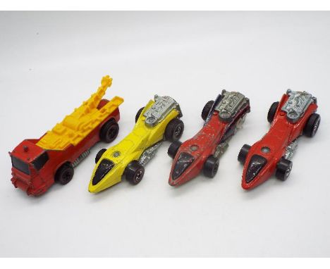 Hot Wheels - Redline - Revvers - 4 x vehicles, three Draggin Dagger models in Red and Yellow and a Towin Terror in Red. They 