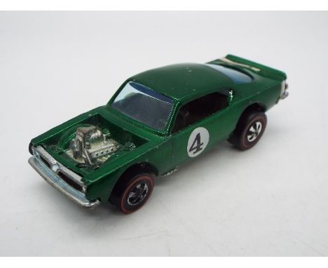 Hot Wheels - Redline - A King Kuda in Green with dark interior. This Hong Kong made example appears in Very Good condition wi