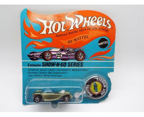 Hot Wheels - Redline - An unopened original carded Show-N-Go series Beatnik Bandit in Olive. This Hong Kong made model appear