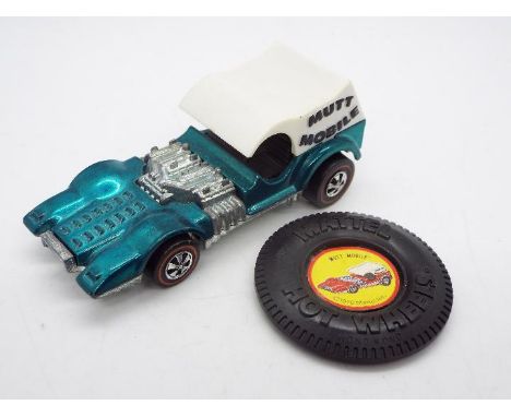 Hot Wheels - Redline - A 1972 Mutt Mobile in Aqua with an original plastic raised letter type Collectors Button. The model ap