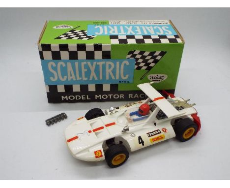 Scalextric Exin (Spain) - A boxed Scalextric C-47 Sigma. The model in white appears to be in Very Good condition overall but 