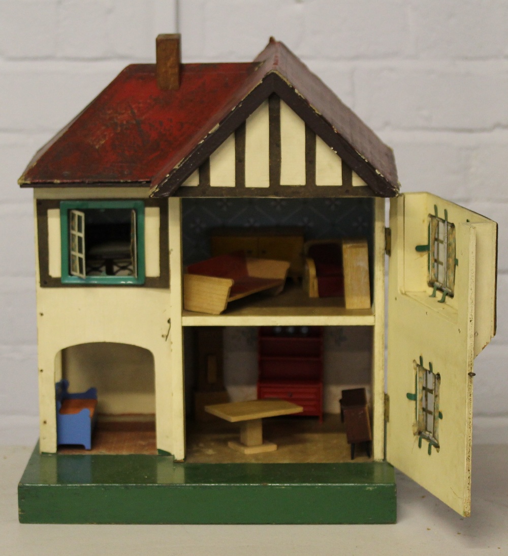 TRIANG DOLLS HOUSE a Triang No. 60 dolls house in the style of 1930s