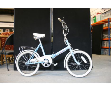 UNIVERSAL BICYCLE - a light blue classic ladies bicycle by Universal, Raleigh Essex.