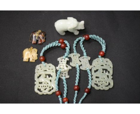 JADE - a collection of jade to include an elephant figurine, 2 necklaces with jade pendants and beads and 2 elephant pendants