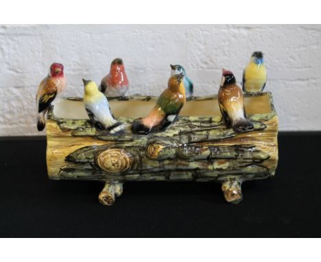 VALLAURIS POTTERY - an early 20th century pottery planter in the shape of 7 birds settled on a log, marked JMF Vallauris (AM)