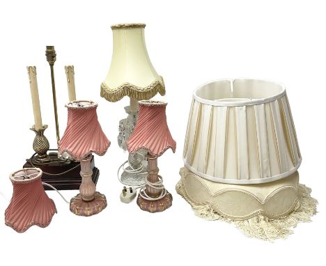 Quantity of table lamps to include pair of pink and gilt glass examples with pink pleated fabric shades, moulded glass exampl