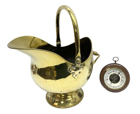 Oak cased Benn Franks Opticians barometer and brass helmet shaped coal scuttle, H47cm