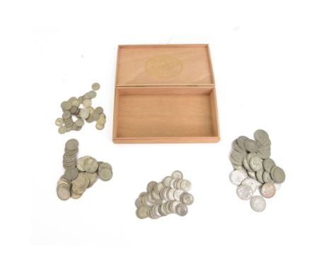 Approximately 1250 grams of Great British pre-1947 silver coins, in a wooden cigar box