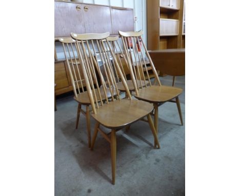 A set of four Ercol Blonde beech and elm Goldsmith chairs 