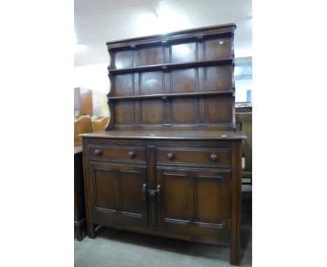An Ercol Golden Dawn elm dresser 