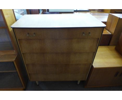 A light oak chest of drawers 