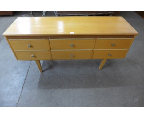 A light oak sideboard 