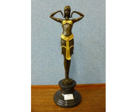 An Art Deco style bronze figure of an Egyptian dancer, manner of Dimitre Chiparus, on black marble socle, 41cms 