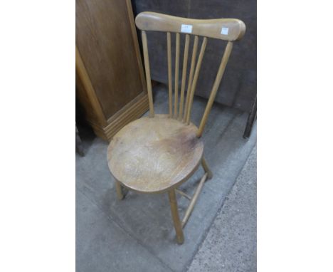 An Ercol style elm and beech chair 