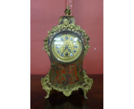 An early 20th Century French Boulle style mantel clock, 32cms h 