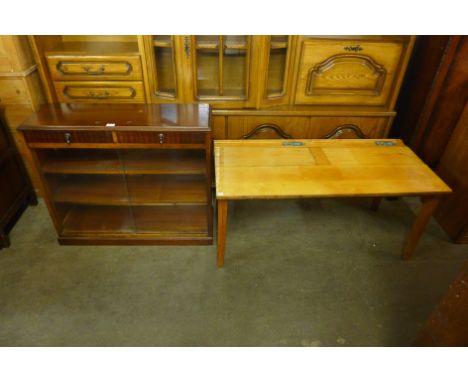 A beech child's double school desk, a folding card table and a small bookcase 