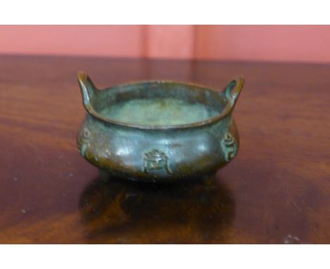 A small Chinese bronze censor, 6cms h 
