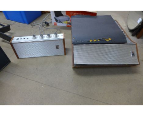A vintage Ultra portable record player and amplifier 