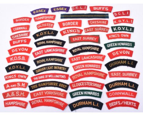 Selection of British Regimental Cloth Shoulder Titles, all being embroidered examples of WW2 vintage and later, including Dev