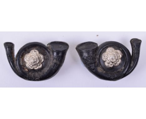 Bakelite Kings Own Yorkshire Light Infantry Collar Badges, blackened plastic with white metal Yorkshire rose to the centre. P