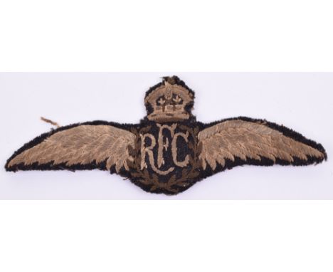 Great War Royal Flying Corps (RFC) Pilots Wing being a later 1916/1917 period example. Wing is a ten-feather example. Wing sh