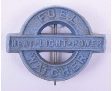 Scarce WW2 Home Front Fuel Watcher Badge, blue plastic badge in the form of a circle with FUEL WATCHER within and a central b