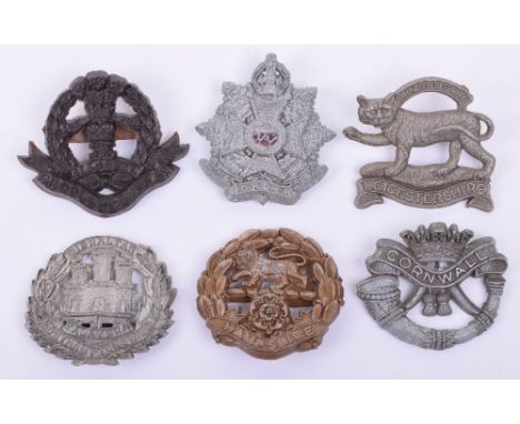 6x WW2 War Economy Plastic Cap Badges, consisting of Middlesex regiment with two blade fittings to the reverse, Duke of Cornw