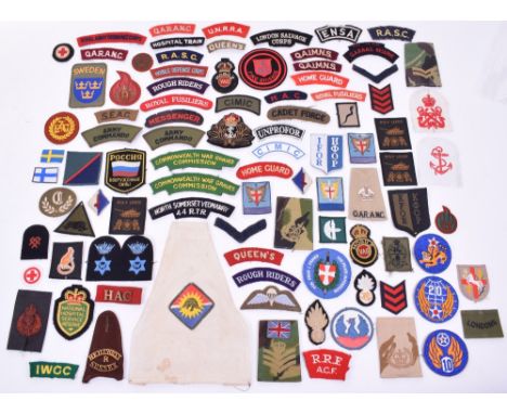 Quantity of Various Items of Cloth Insignia, shoulder titles, formation signs, trade badges etc. Various periods and conditio