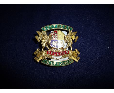 Gilt and enamel Southern Pullman Golden Arrow cap badge the reverse stamped L Simpson London Ltd 