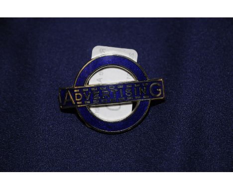 London Transport blue enamel advertising cap badge by J. R Gaunt London