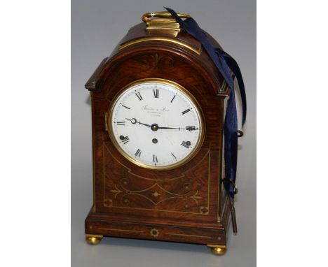 Thwaites and Reed, Clerkenwell, London. An early 19th century rosewood, brass strung and ormolu mounted mantle clock. The tri
