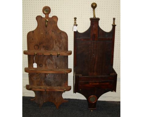 A rustic elm wall hanging knife board with shaped outline 102 x 44 cms. together with a mahogany longcase clock movement and 