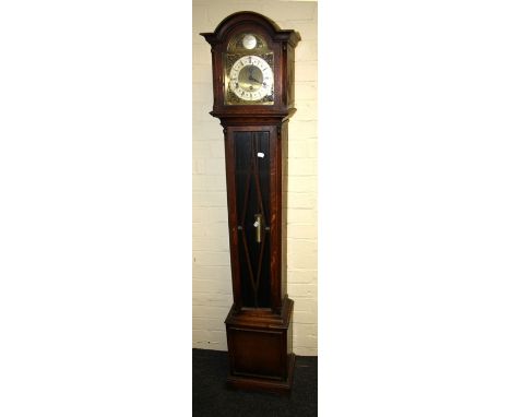 A circa 1903's oak cased grandmother longcase clock, Westminster chiming movement striking on twelve gongs faced by an 8" bra