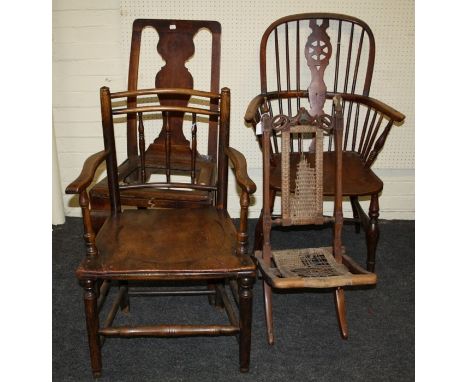 A 19th century wheel and stick back windsor armchair, two other vernacular dining chairs and an Edwardian folding steamer cha