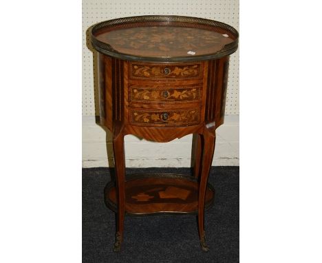 A French Louis XVI style marquetry inlaid kingwood pettit commode with gallery top and fitted three short drawers raised on g