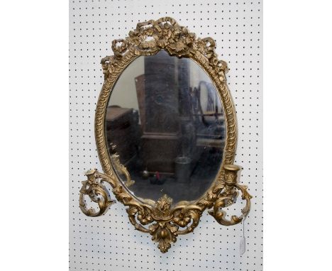 A 19th century giltwood and gesso girondole wall mirror with a ribbon tied florally decorated frame and two branches (a/f). 6
