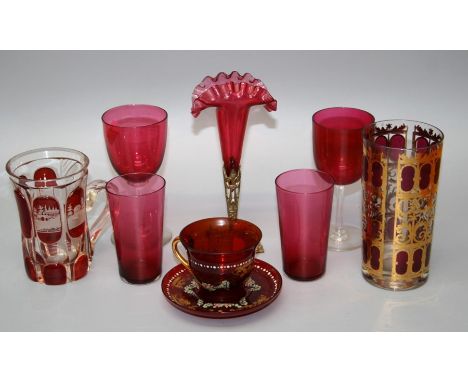 A collection of Victorian/Edwardian emerald cranberry and ruby bowled wine glasses with clear stems and spreading bases ( var