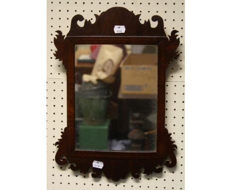 A Geo III parquet line inlaid scroll framed wall mirror.42cm high